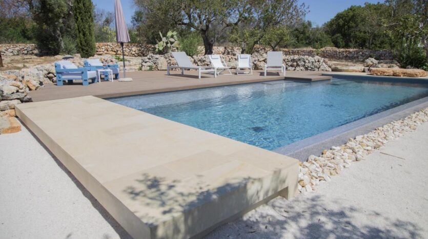 A refreshing pool area perfect for relaxing under the warm Apulian sun.