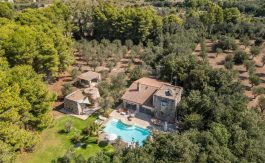Aerial view of a luxury villa in puglia with private pool and mediterranean grounds
